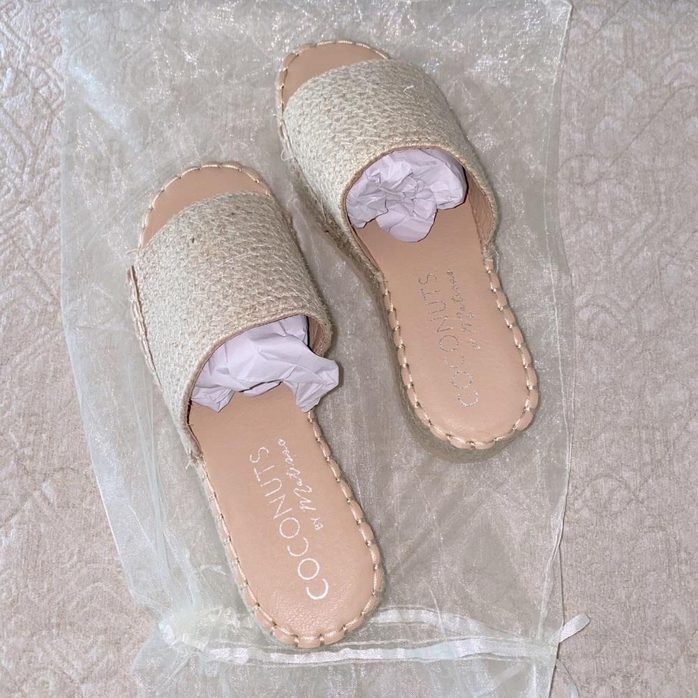 Brand new Woven slip on sandals. Size 7